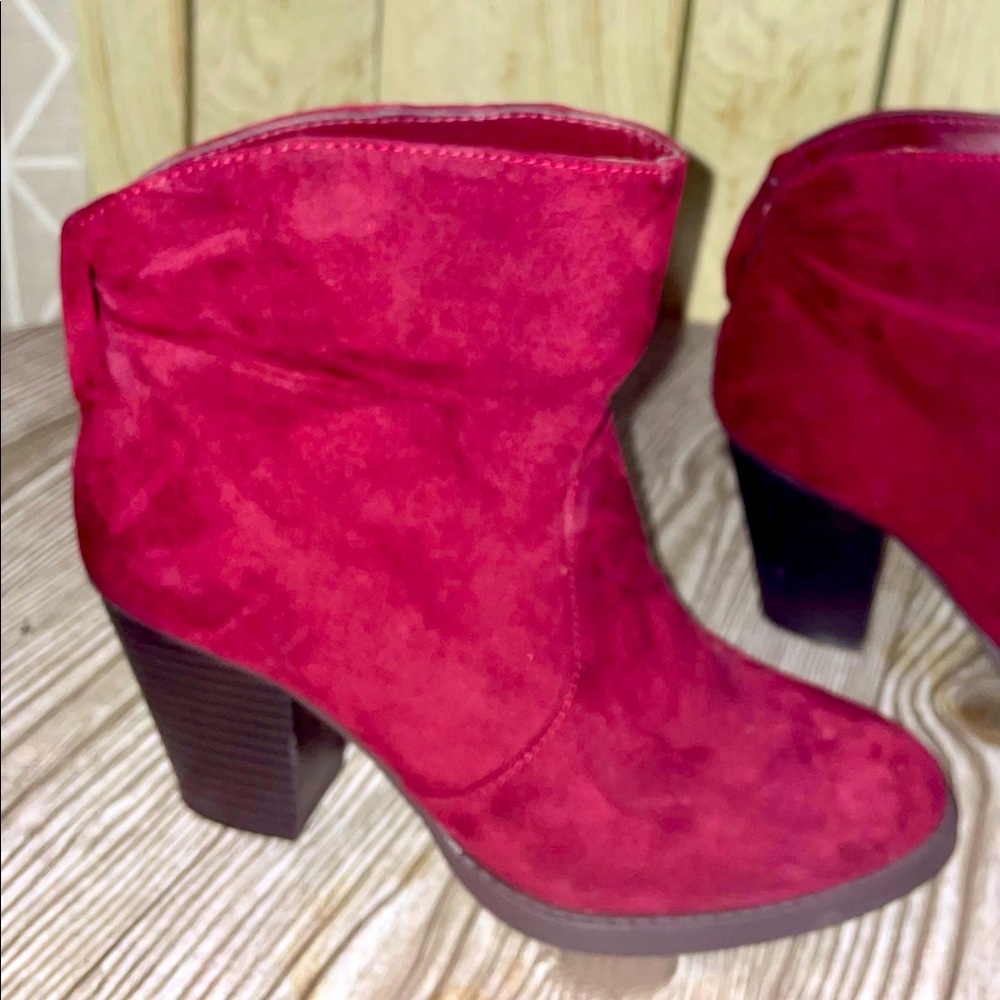 Darker red in color closer to a burgundy but only worn once! Super cute & comfy
